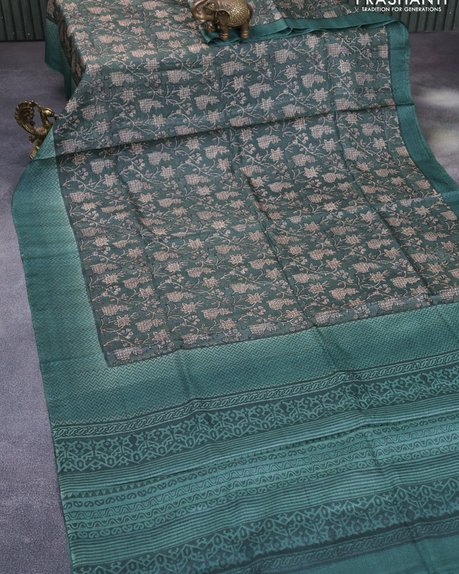 Pure tussar silk saree green shade with allover floral prints and printed border