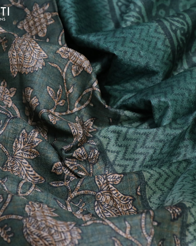 Pure tussar silk saree green shade with allover floral prints and printed border