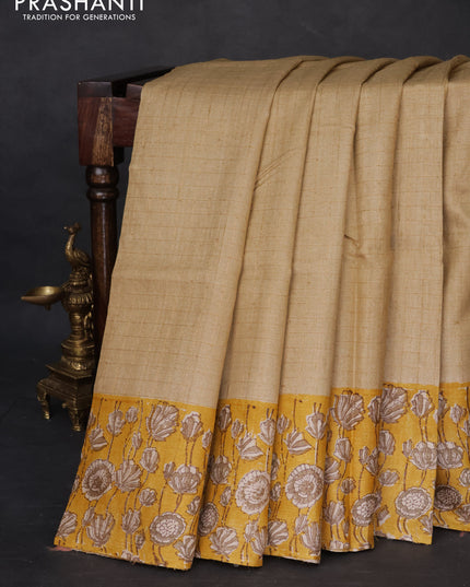 Pure tussar silk saree beige and yellow with allover zari checked pattern and kalamkari printed border