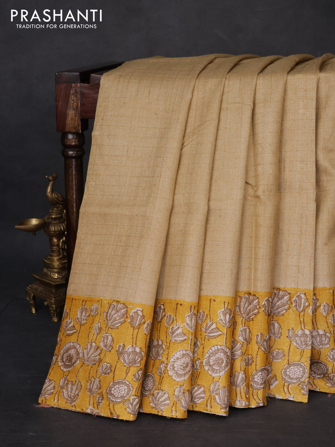 Pure tussar silk saree beige and yellow with allover zari checked pattern and kalamkari printed border