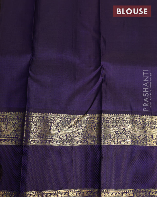 Pure kanchipuram silk saree light green and deep jamun with allover zari woven lakshadeepam pattern and rich zari woven simple border