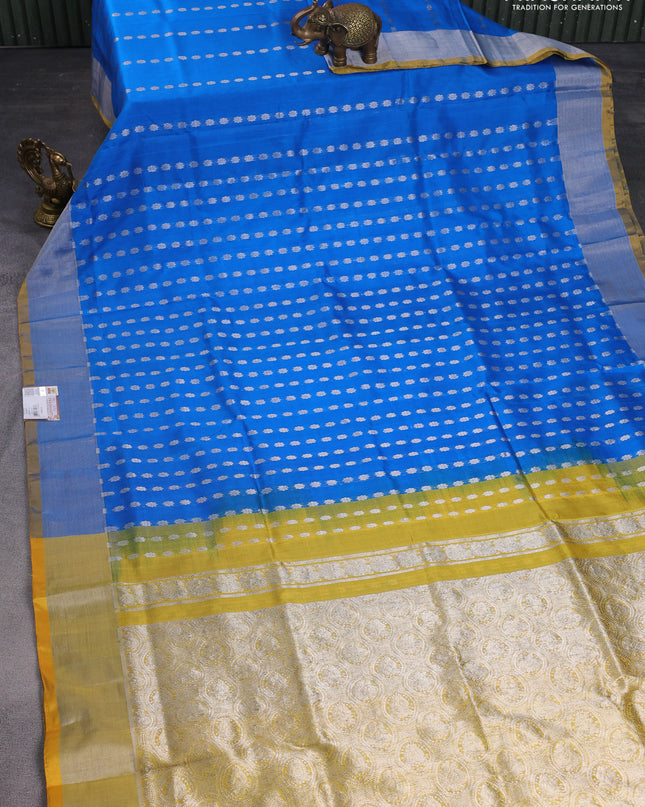 Pure uppada silk saree cs blue and mustard yellow with allover silver zari woven buttas and silver zari woven border