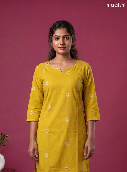 Mustard Yellow Cotton Printed & Simple Embroidery Work Neck Pattern Straight Suit
