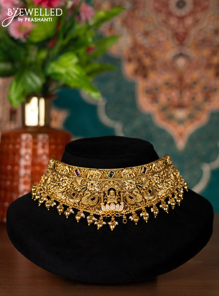 Antique choker lakshmi design with kemp & cz stones and golden beads hangings
