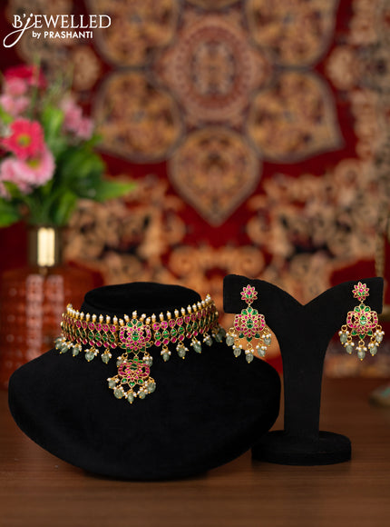 Jadau choker with jadau kemp stone and golden beads hangings