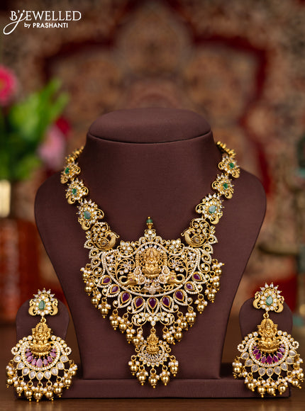 Antique necklace lakshmi pendant with kemp & cz stones and pearl & golden beads hangings