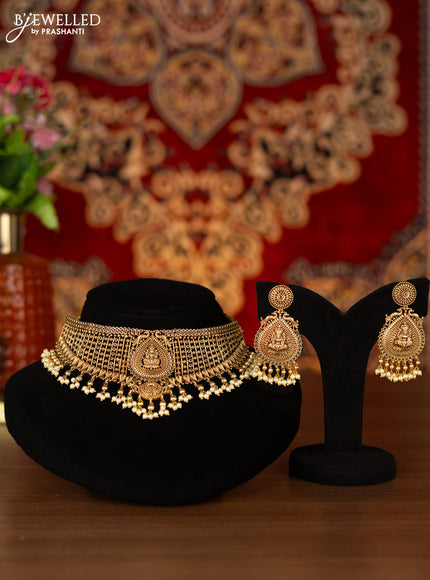 Antique choker lakshmi design with kemp stones and pearl hangings