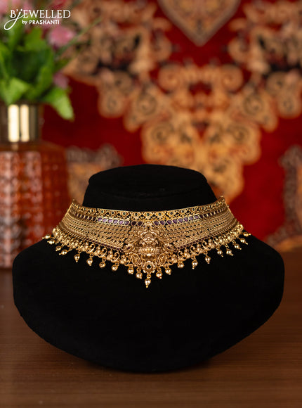 Antique choker lakshmi design with kemp stones and golden beads hangings