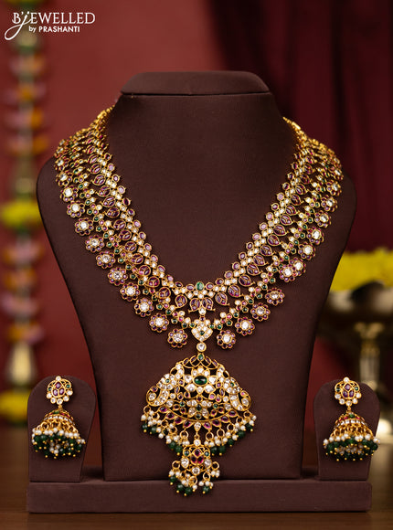 Antqiue necklace with floral pendant in kemp stones and pearl hangings