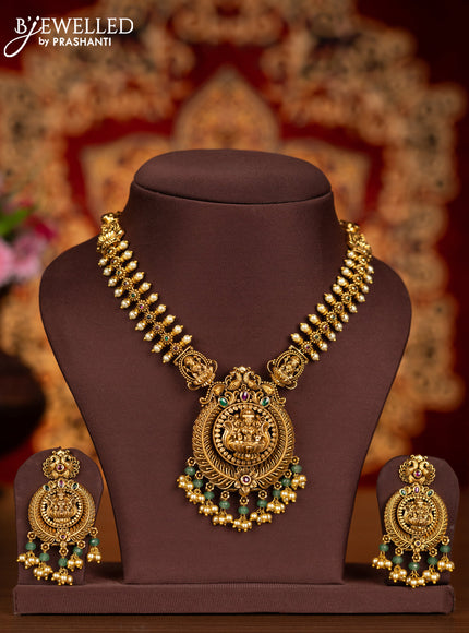 Antique necklace lakshmi pendant with kemp stones and pearl hangings