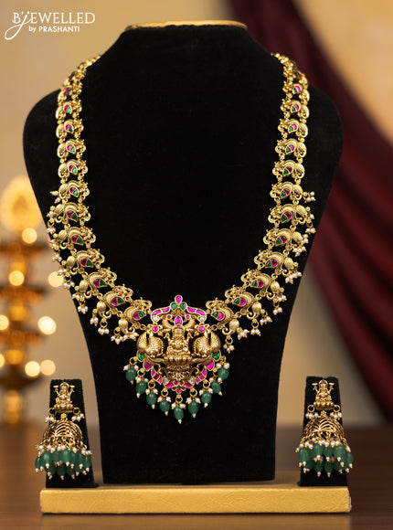 Jadau haram peacock design with jadau kundan stones and perals & green beads hangings