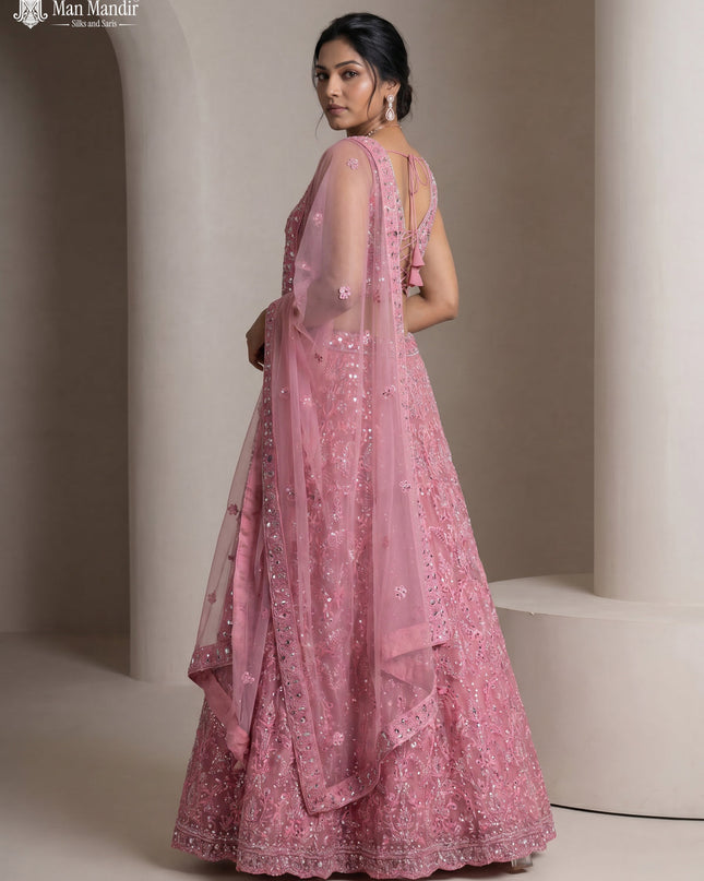 Peach Pink Netted Lehenga Set With Can Can Skirt & Mirror Embroidered Blouse