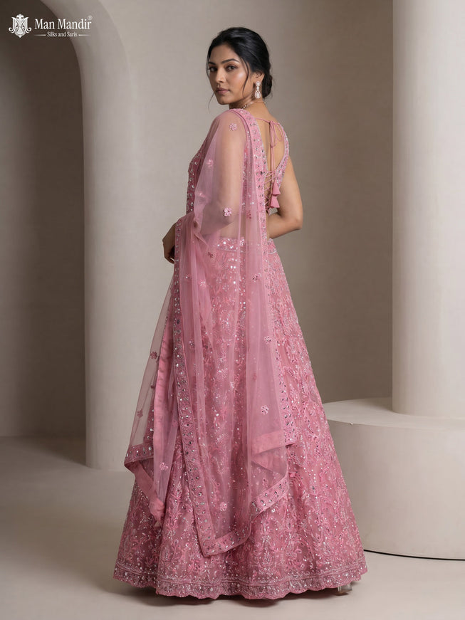 Peach Pink Netted Lehenga Set With Can Can Skirt & Mirror Embroidered Blouse