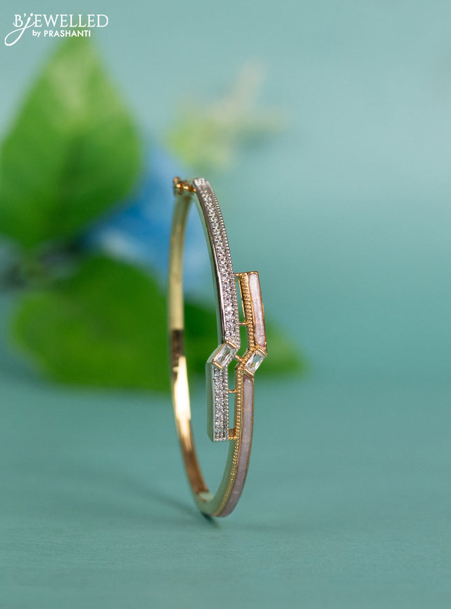 Zircon bracelet with light pink enamal and cz stones in gold finish