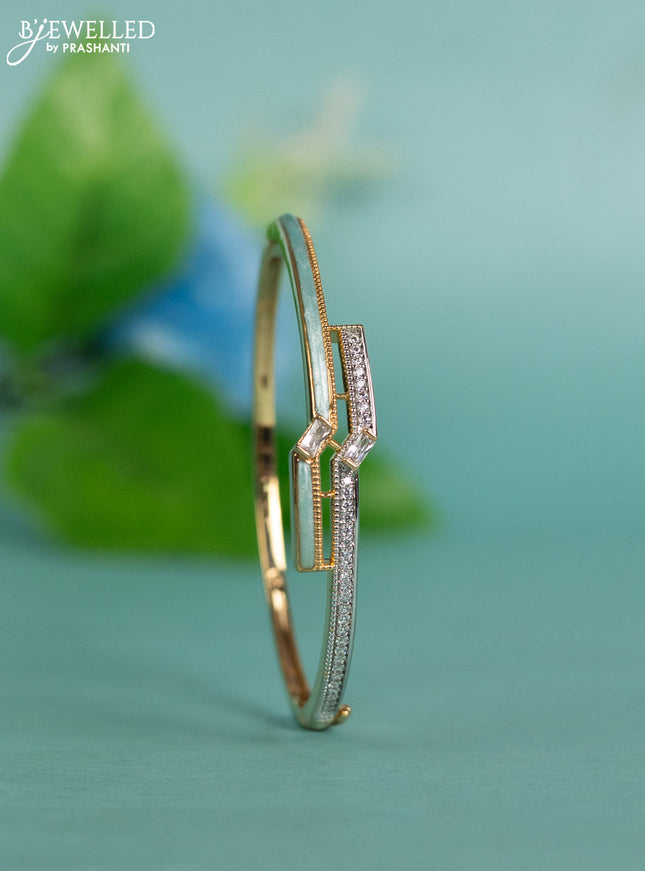 Zircon bracelet with ice blue enamal and cz stones in gold finish