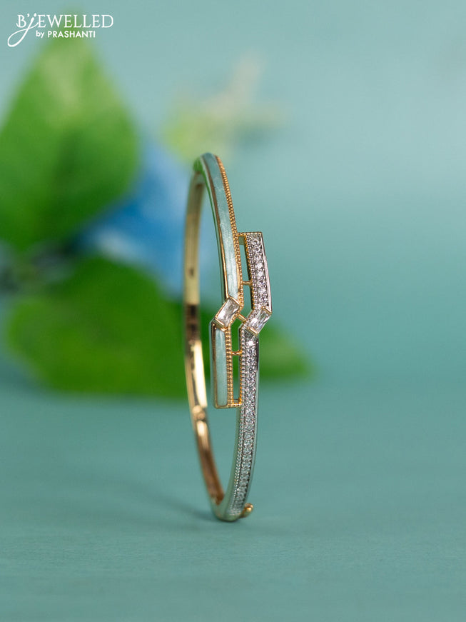 Zircon bracelet with ice blue enamal and cz stones in gold finish