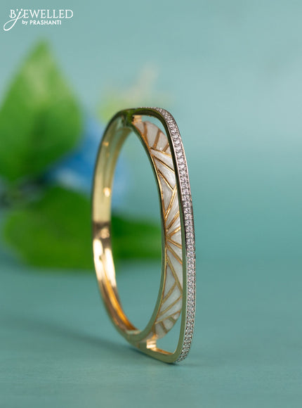 Zircon bracelet with white enamel and cz stones in gold finish