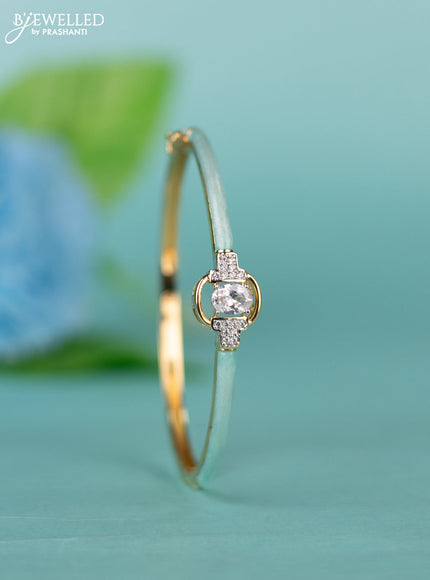 Zircon bracelet with ice blue enamal and cz stones in gold finish