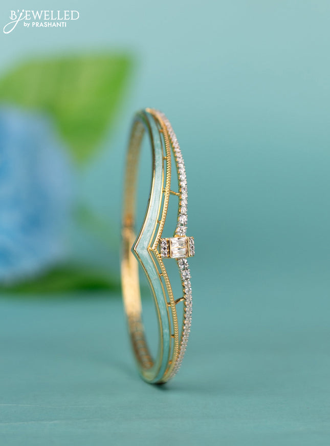 Zircon bracelet with ice blue enamal and cz stones in gold finish
