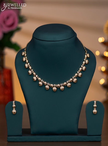 Zircon necklace with cz stones in gold finish