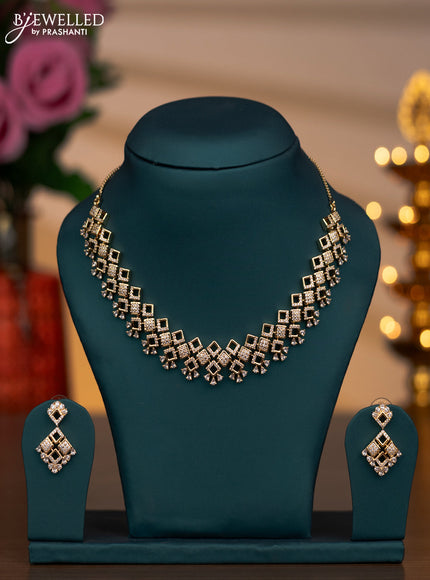 Zircon necklace with cz stones in gold finish
