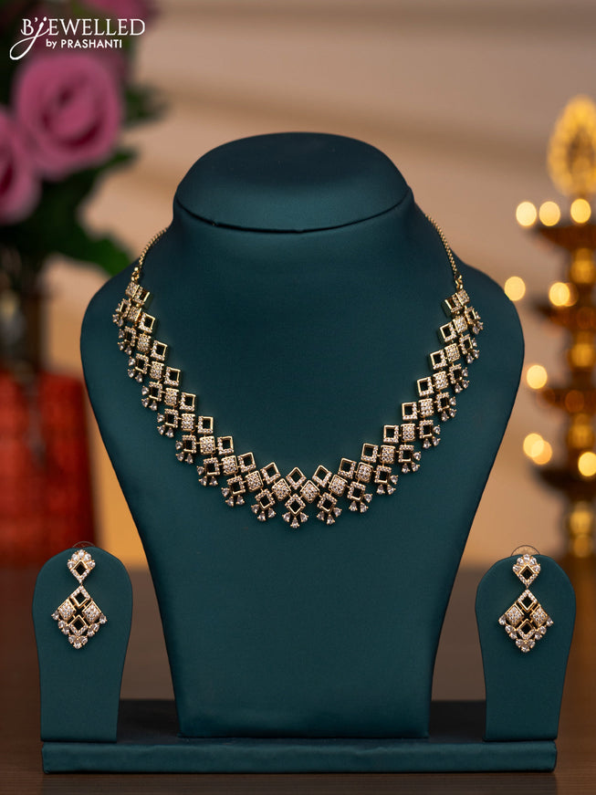 Zircon necklace with cz stones in gold finish
