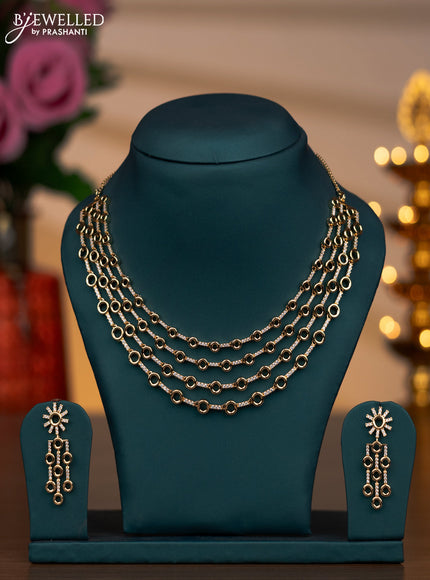 Zircon multilayer necklace with cz stones in gold finish