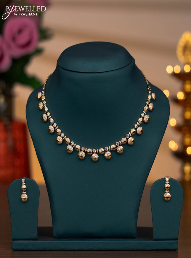 Zircon necklace with cz stones in gold finish