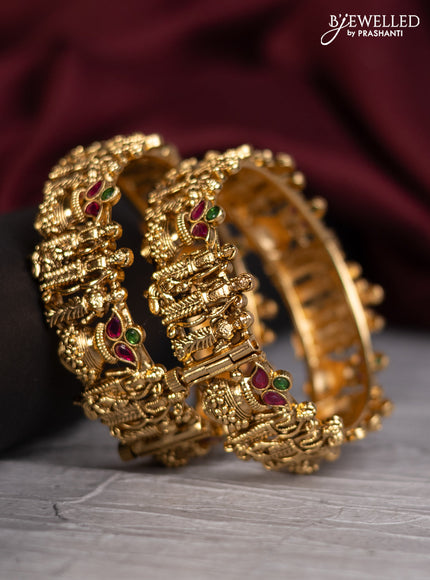 Antique screw type bangles with ram darbar & kalashs design and kemp stones
