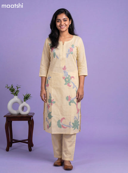 Pale Yellow Cotton Floral Embroidery Work Straight Suit