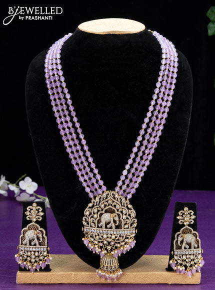Beaded purple elephant pendant necklace with cz stones and beads hangings