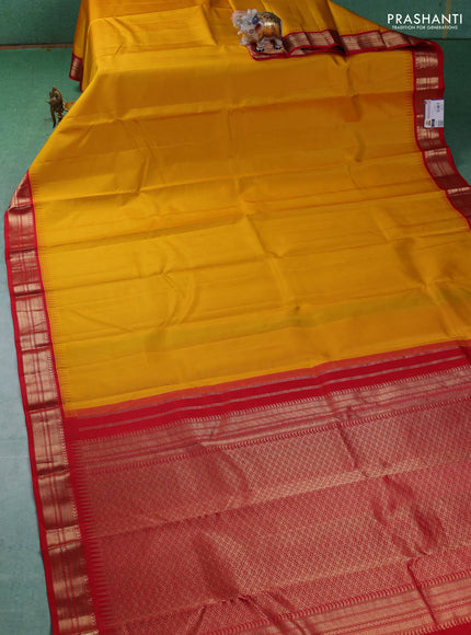 Pure kanchipuram silk saree mustard yellow and red with plain body and zari woven korvai border