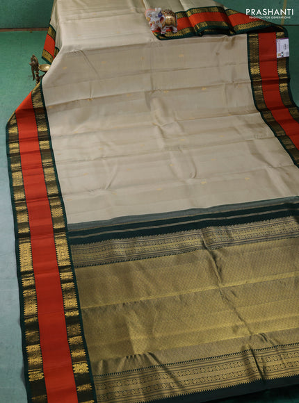 Pure kanchipuram silk saree beige and Bottle green with allover vairaosi pattern & buttas and rettapet zari woven border