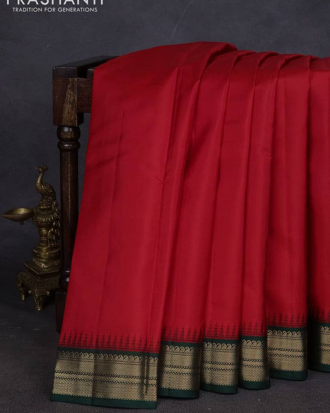 Pure kanchipuram silk saree teal blue and red with plain body and zari woven korvai border