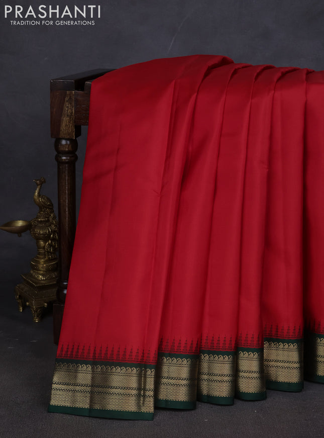 Pure kanchipuram silk saree red and green with plain body and zari woven korvai border