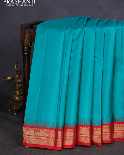 Pure kanchipuram silk saree red and green with plain body and zari woven korvai border