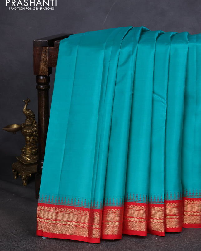 Pure kanchipuram silk saree red and green with plain body and zari woven korvai border