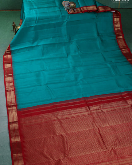 Pure kanchipuram silk saree red and green with plain body and zari woven korvai border