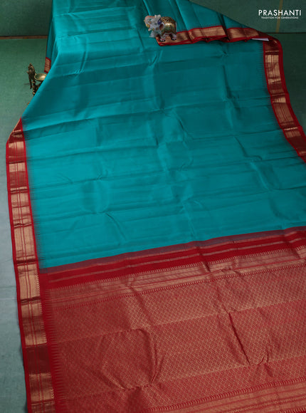 Pure kanchipuram silk saree blue and red with plain body and zari woven korvai border