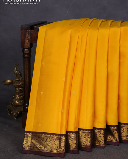 Pure kanchipuram silk saree yellow and brown with zari woven buttas and zari woven border