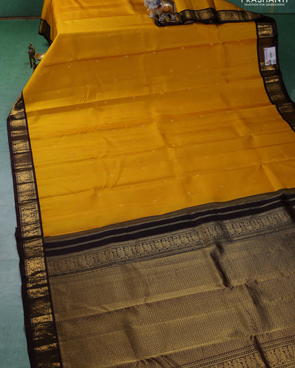 Pure kanchipuram silk saree yellow and brown with zari woven buttas and zari woven border