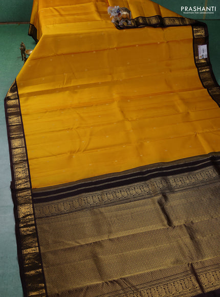 Pure kanchipuram silk saree yellow and brown with zari woven buttas and zari woven border