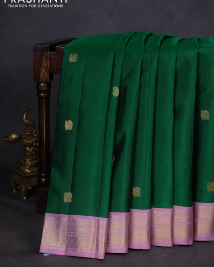 Pure kanchipuram silk saree green and lavender with annam & Paisley zari woven buttas and zari woven korvai border