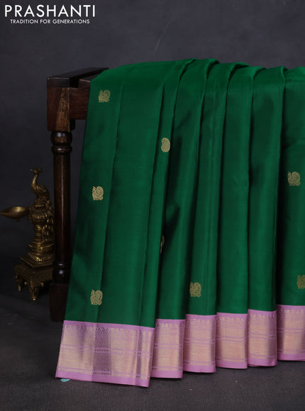 Pure kanchipuram silk saree green and lavender with annam & Paisley zari woven buttas and zari woven korvai border