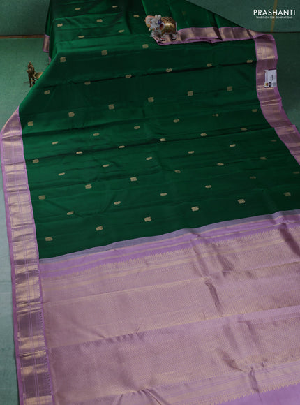 Pure kanchipuram silk saree green and lavender with annam & Paisley zari woven buttas and zari woven korvai border