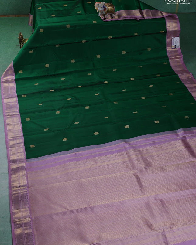 Pure kanchipuram silk saree green and lavender with annam & Paisley zari woven buttas and zari woven korvai border