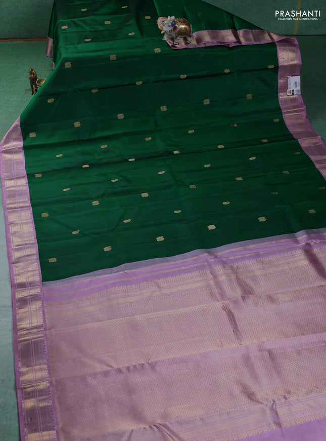 Pure kanchipuram silk saree green and lavender with annam & Paisley zari woven buttas and zari woven korvai border