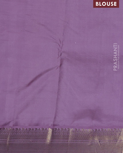 Pure kanchipuram silk saree green and lavender with annam & Paisley zari woven buttas and zari woven korvai border