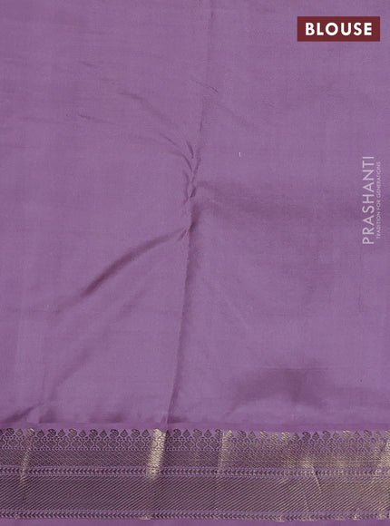 Pure kanchipuram silk saree green and lavender with annam & Paisley zari woven buttas and zari woven korvai border
