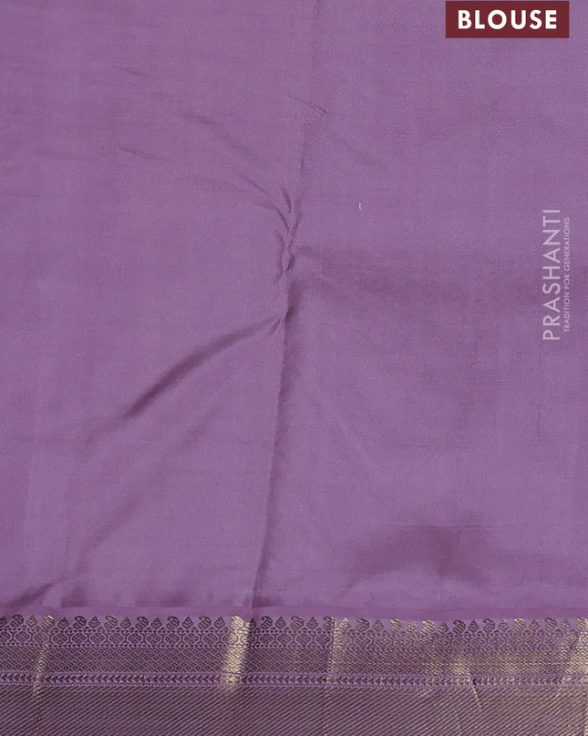 Pure kanchipuram silk saree green and lavender with annam & Paisley zari woven buttas and zari woven korvai border